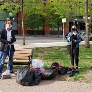 SPDA staff with garbage bags full of collected trash
